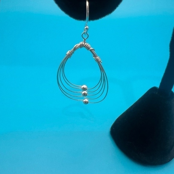 Multi Hoops with moving silver balls dangle earrings. - Picture 8 of 12